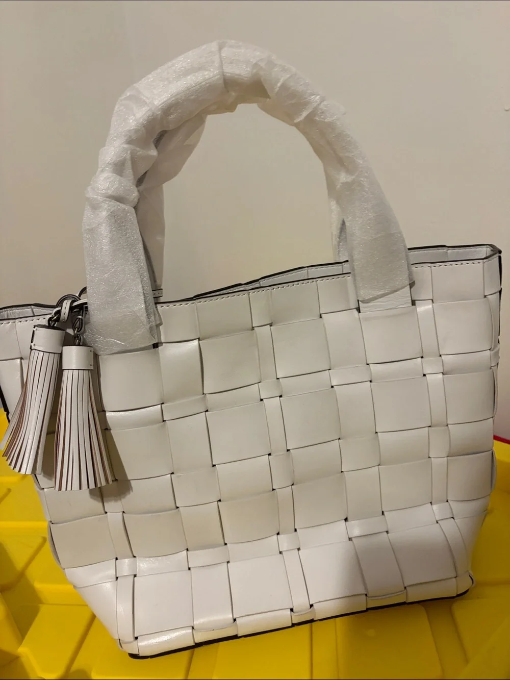 Woven White Tote Bag with Tassel Accent